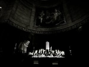 Woman praying in church