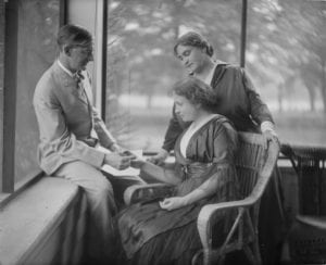 Portrait of Helen Keller with Annie Sullivan Macy and John Macy