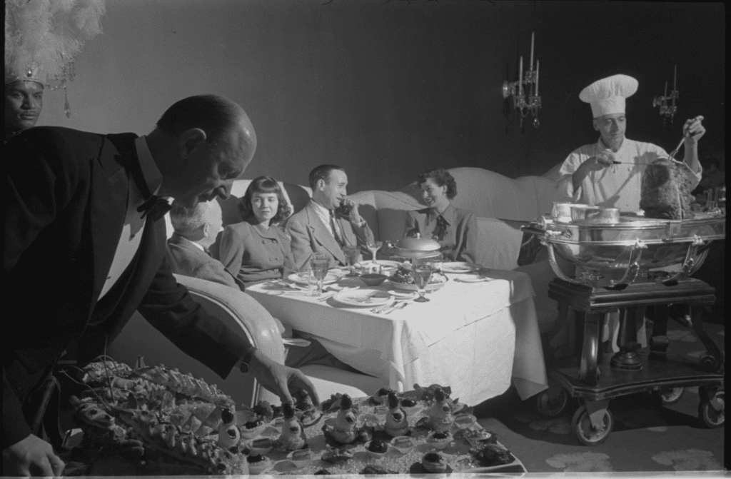 A photograph by Stanley Kubrick showing a family eating dinner in Chicago