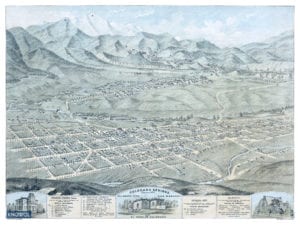 An old map showing Colorado Springs, Colorado City, and Manitou Springs as they looked in 1874. The map is in color and shows the streets and old landmarks. The map also has a detailed guide that labels each landmark and major church.
