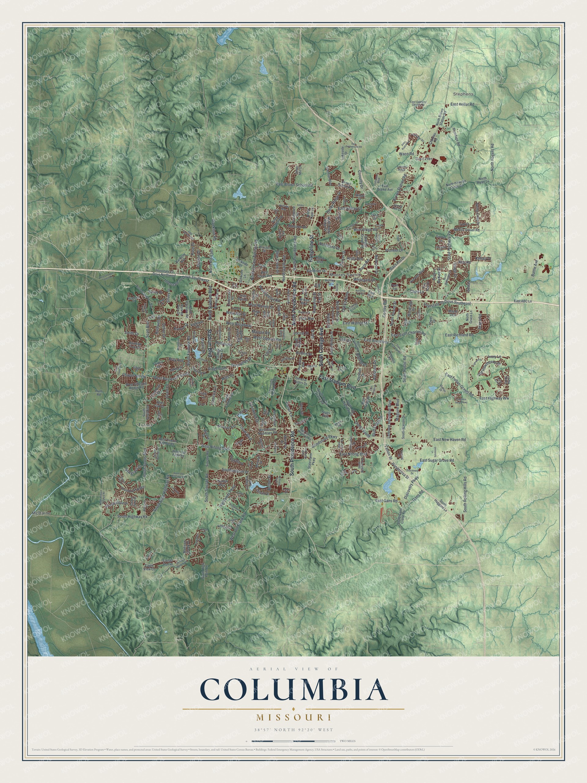 Full aerial map of Columbia, Missouri, with red buildings, green shaded hills, blue streams and a cream title panel